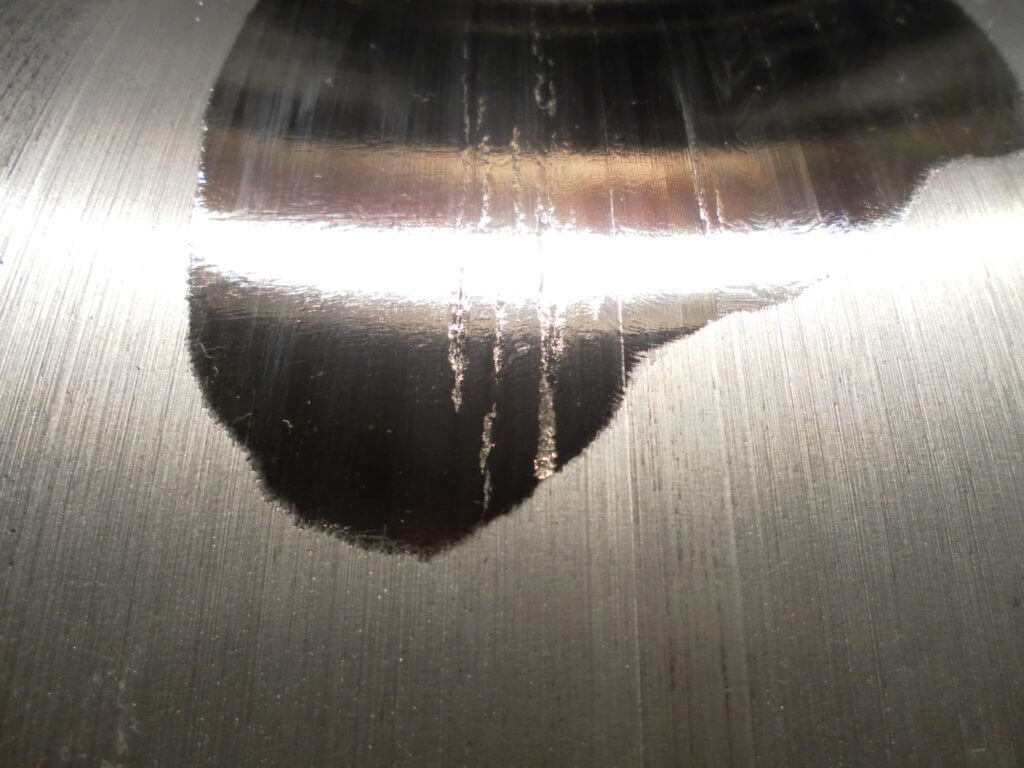 Surface Cracking and High Hardness visible after baseline machining by Goltens' In-place machinists