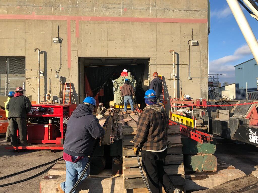 Moving emergency generator into powerhouse at nuclear plant - Goltens