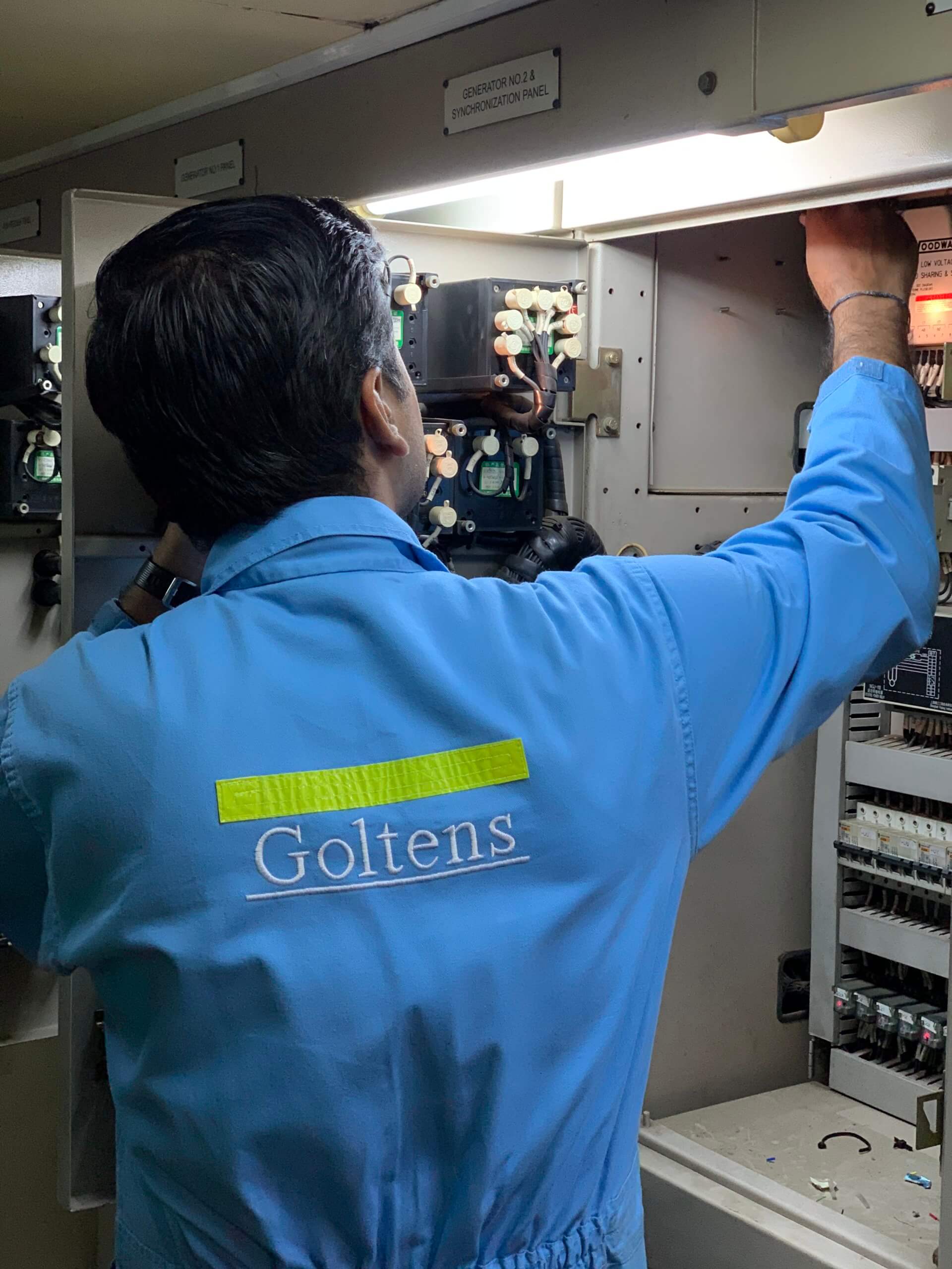Goltens technician removing the obsolete 2301A LSSC