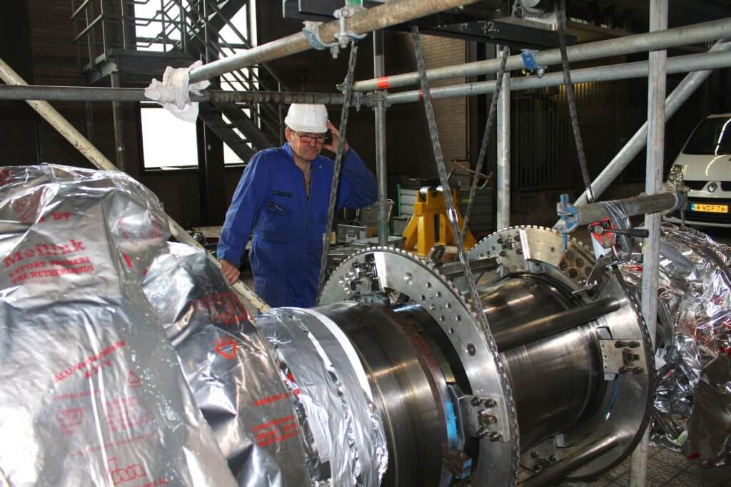 Goltens' In-place journal cutting tools at work on turbine generator rotor shaft.