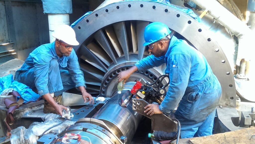Goltens technicians machining gas turbine rotor shaft