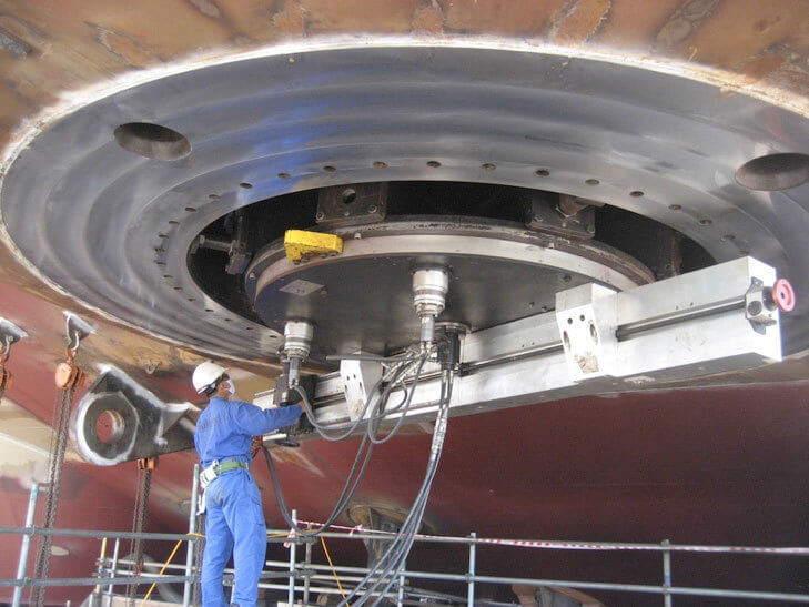 Goltens in-place machinists conducting large diameter inverted flange facing