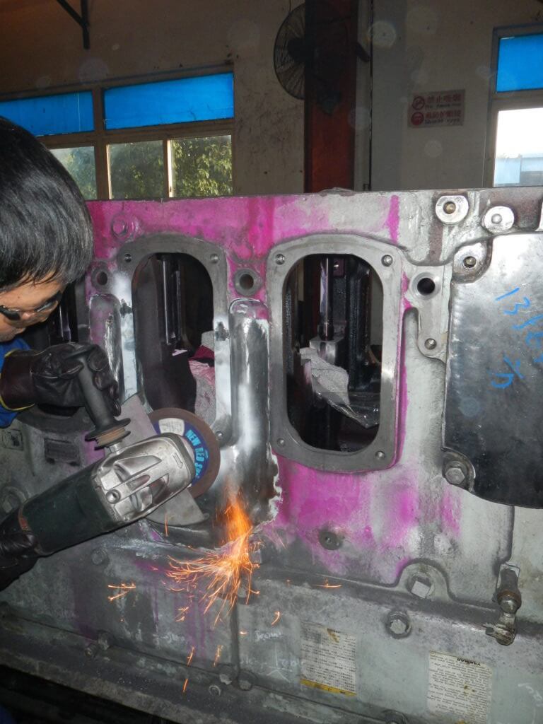 Goltens undertaking Finish machining to complete the engine block repair with metal stitching