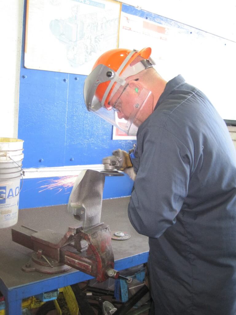 Cast Iron Repair/Engine Block Repair - Shaping replacement piece for insertion into damaged block