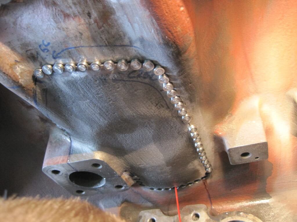 Cast Iron Repair - Metal Stitching in progress