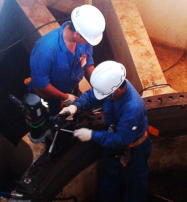 Goltens In-place machinists drilling and Tapping 1 of 114 bolt holes per flange for the ABB Thruster