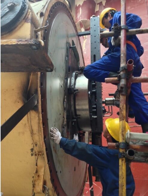 Goltens in-place machinists Installing flange facing machine on crane pedestal
