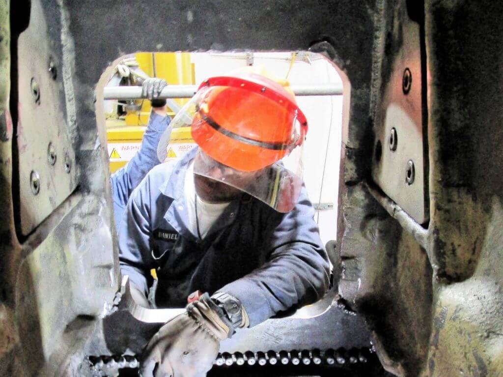 Metal Stitching pins being inserted for engine block repair