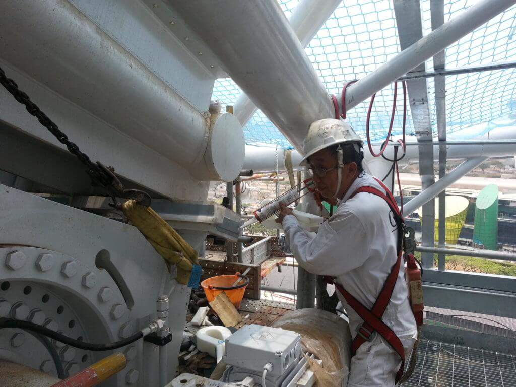 Goltens filling gaps on the Sportshub winch footings with Chockfast Orange