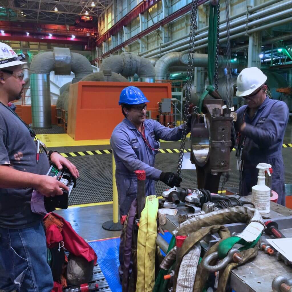 Goltens technicians performing Calibration check on connecting rods at a nuclear power plant