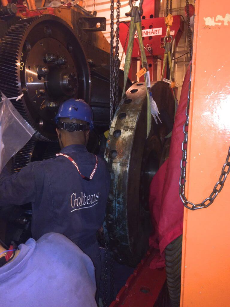 Reassembly of front end of the nuclear power plant's backup Worthington diesel generator