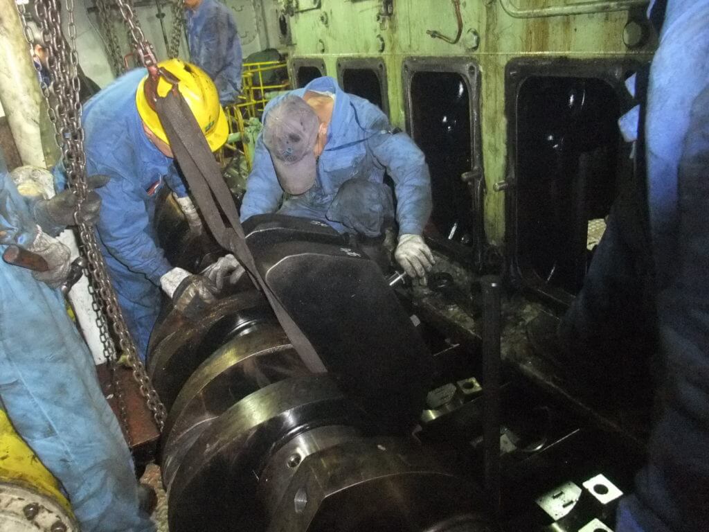 Goltens technicians removing damaged crankshaft prior to line boring the engine