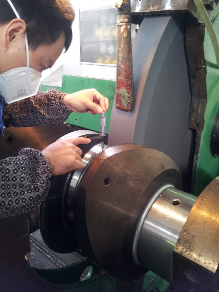 Preparing the crankshaft for grinding in Goltens workshop